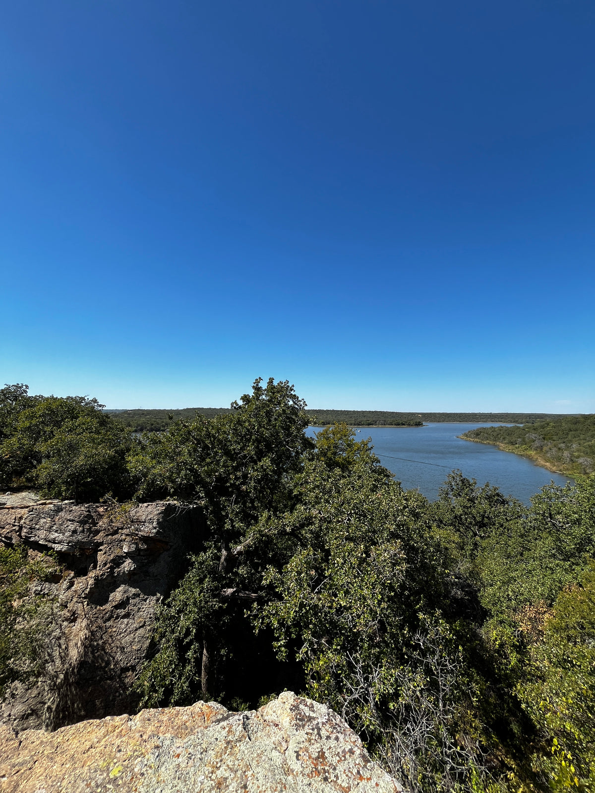 A rocky lookout over a river valley.