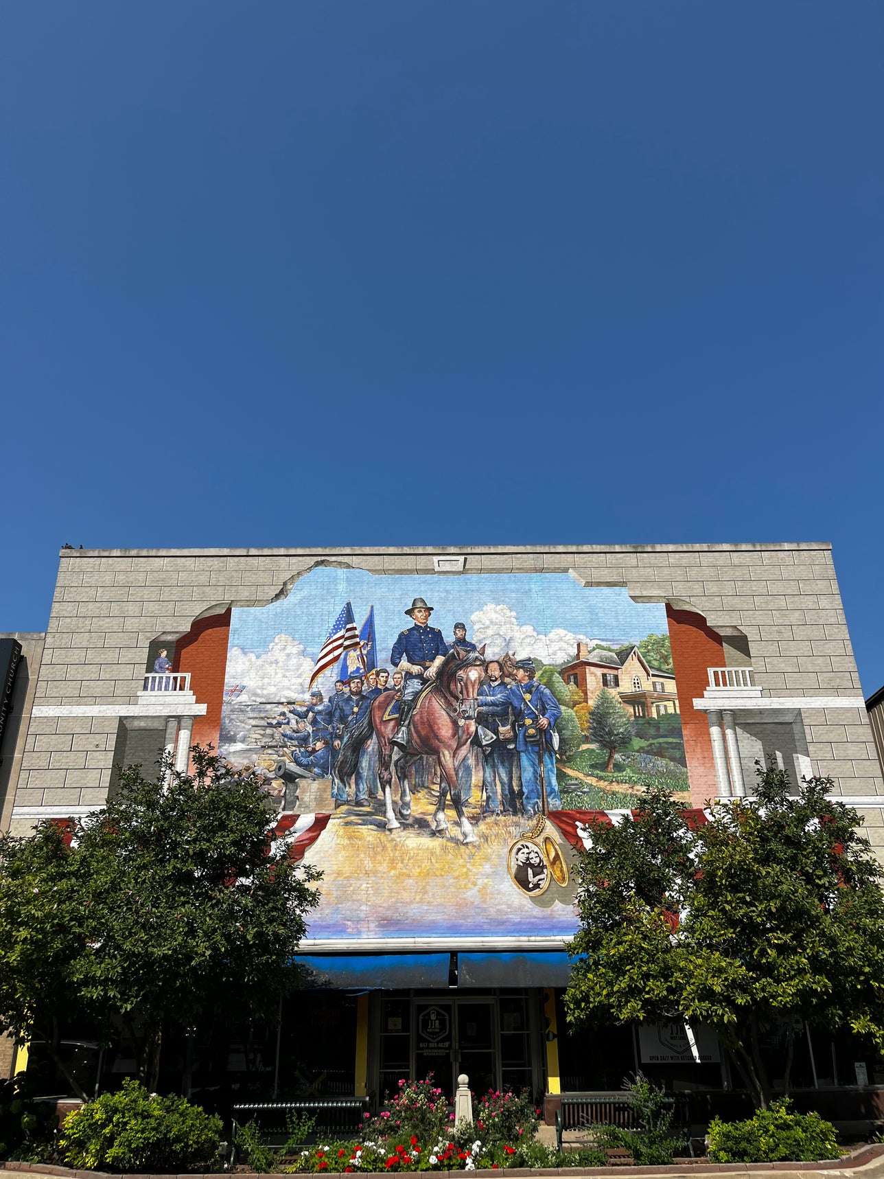 A large mural painted on the side of a building.