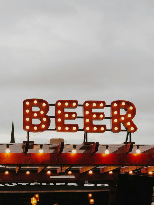 Red lit-up beer sign
