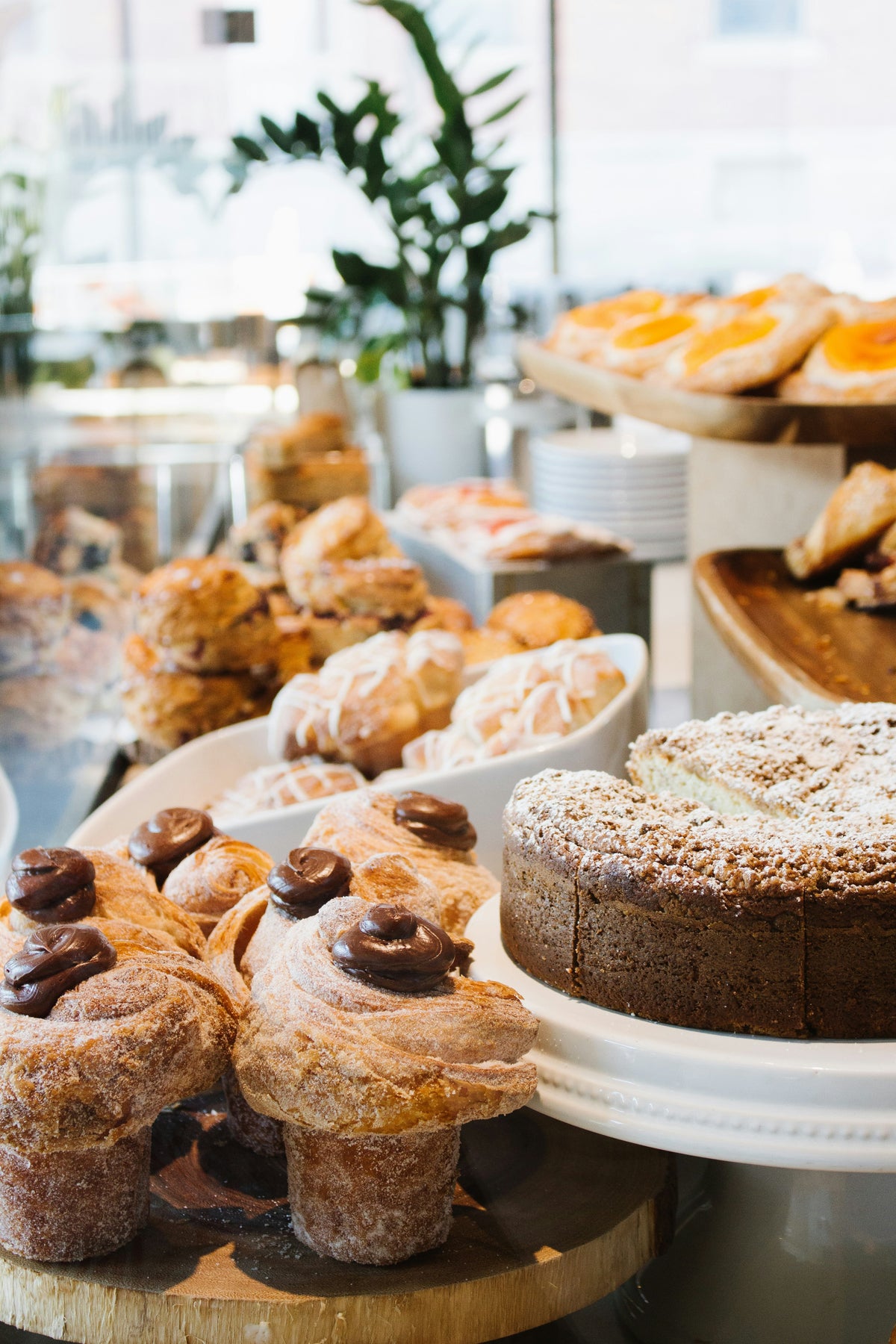Muffins and baked goods on display at a bakery.