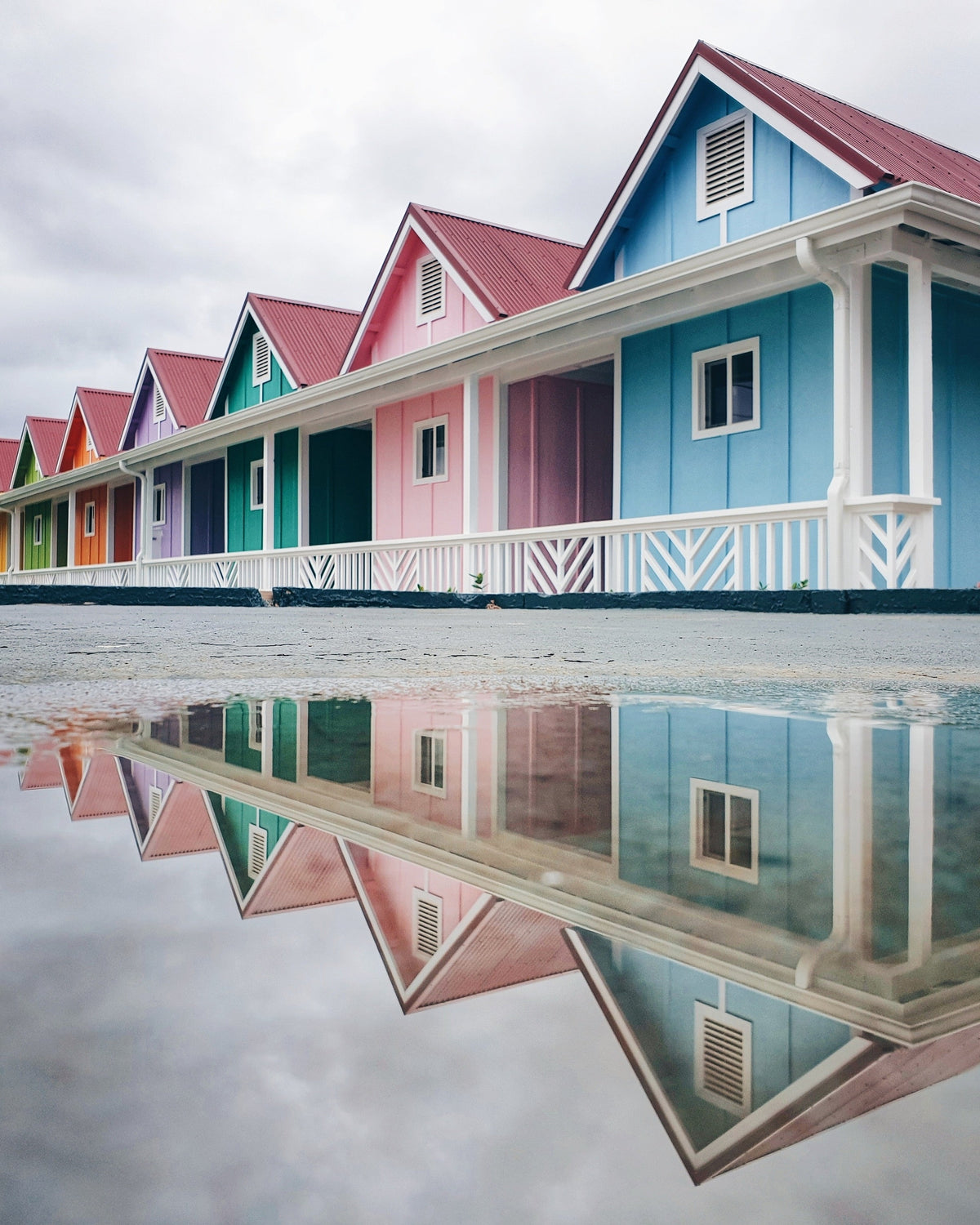Colorful houses along a beach.