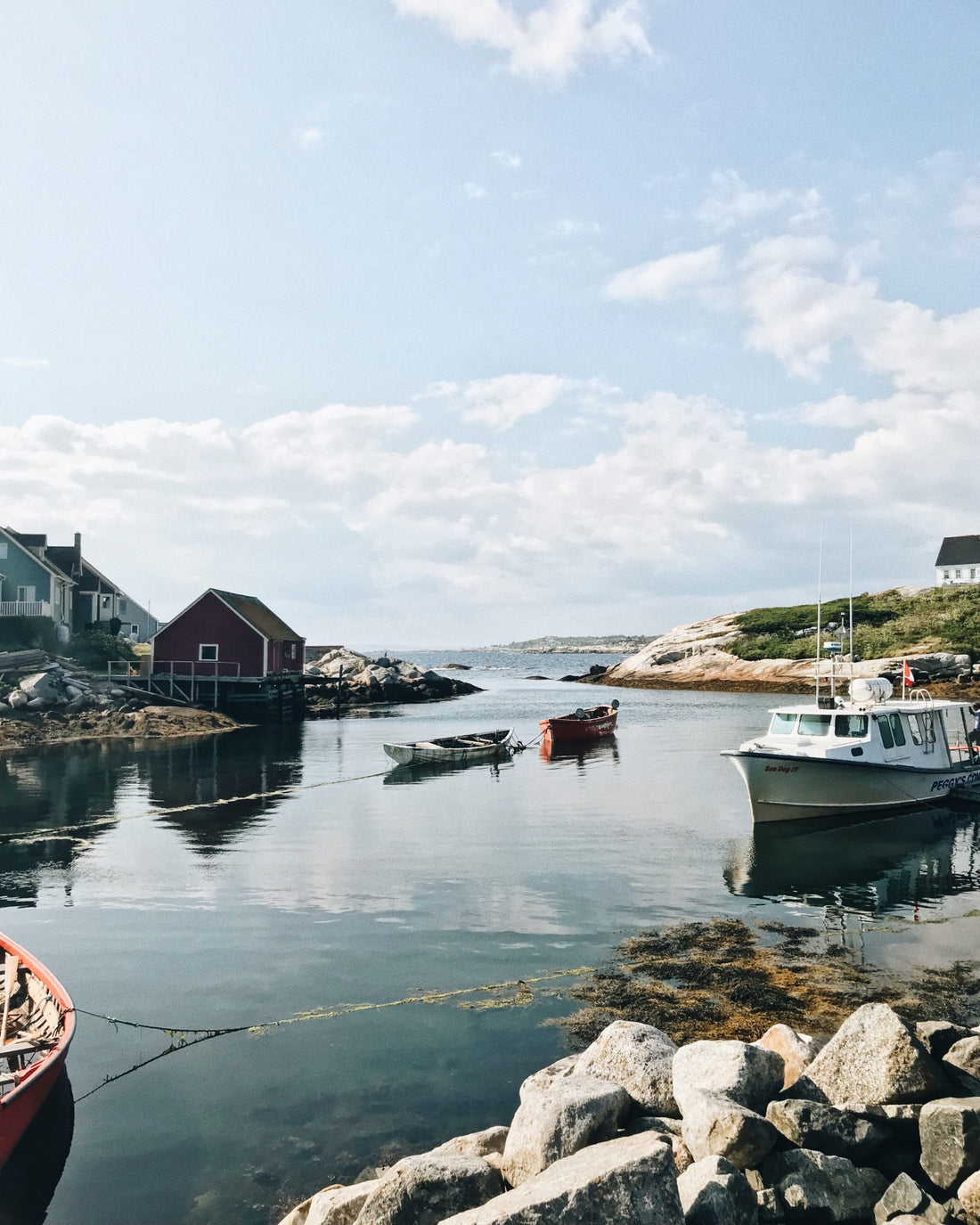 Maritime boats and boathouses.