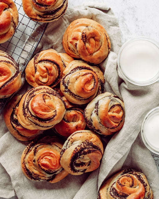 Sweet rolls on a tea towel.