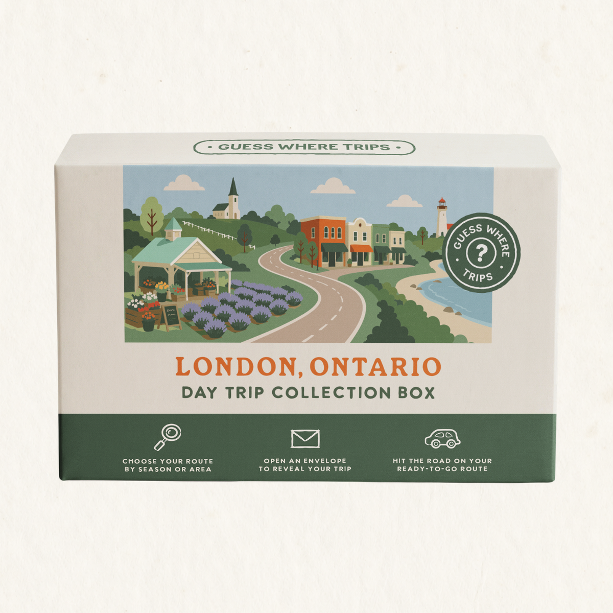 London Day Trip Box by Guess Where Trips, illustrated with a lavender field, a gazebo, a small-town main street and a lakeside lighthouse.