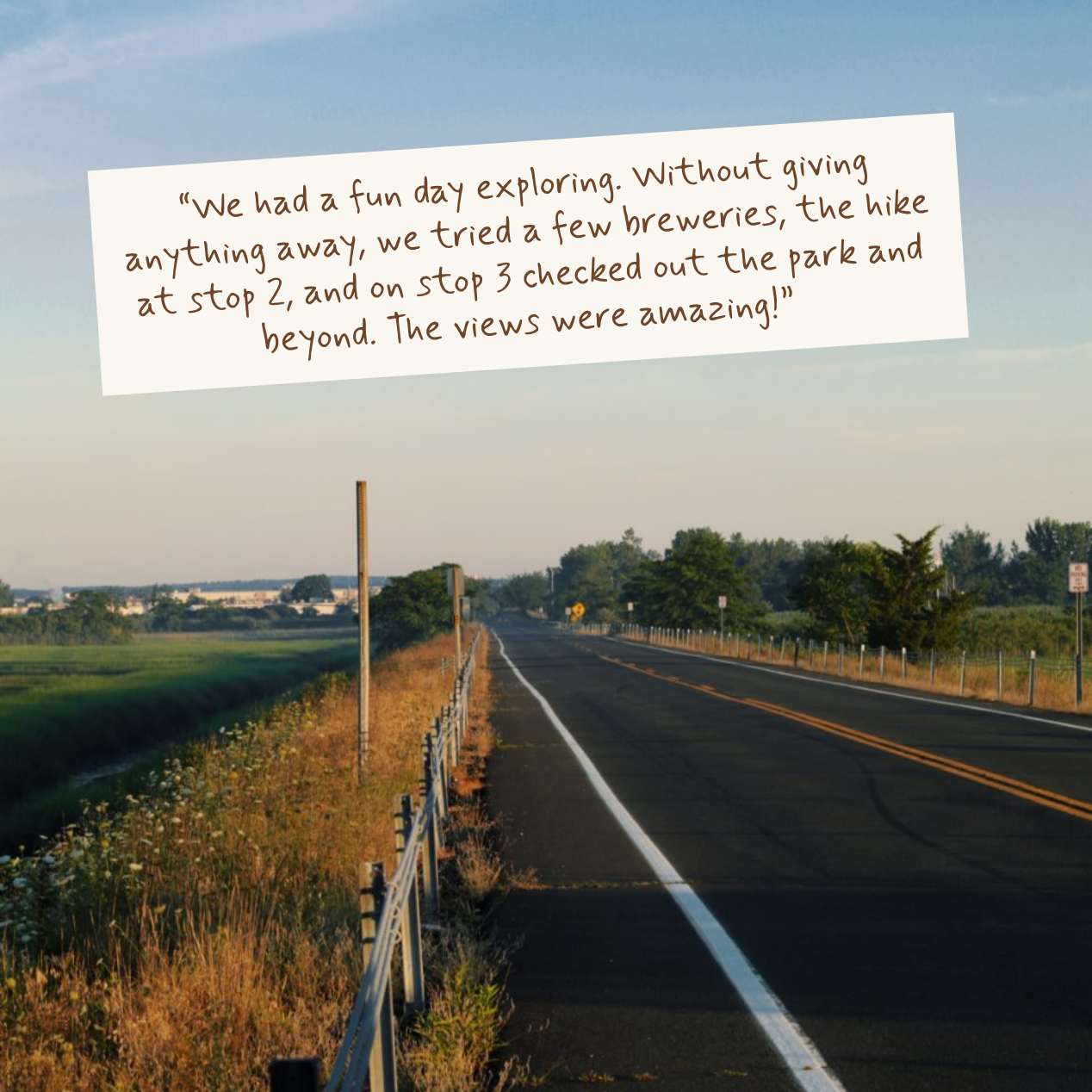 A scenic road stretches through a rural landscape under a pale blue sky, with a white paper note overlaid near the top containing a handwritten-style quote in brown text.