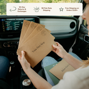 A person sitting inside a car holds several brown kraft paper mailers with printed circular logos and the text 'Your First Stop.' A white promotional banner overlays the top with shipping benefits, and another mailer is visible on the lap.