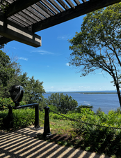 Overlook in front of blue sky and water