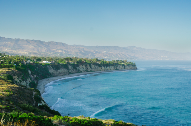 Cliffs overlooking a blue ocean