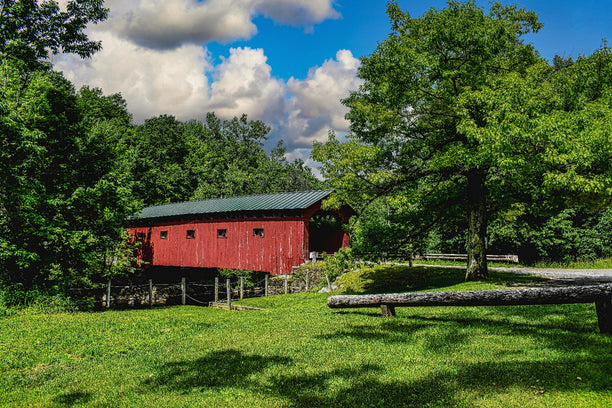 Red Covered Bridge among greenery