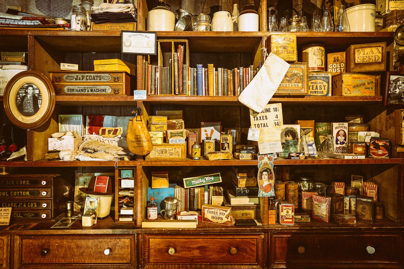 Boutique shop with bookshelves full of trinkets.